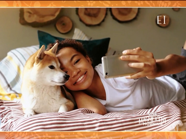 Girl takes selfie with her dog